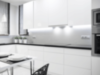 white dominant kitchen with under cabinet lights in cool white light