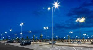 Nearly empty parking lot with LED lights