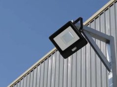 LED flood light mounted on a metal wall