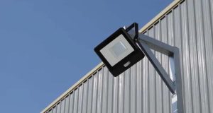 LED flood light mounted on a metal wall