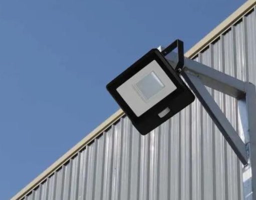 LED flood light mounted on a metal wall