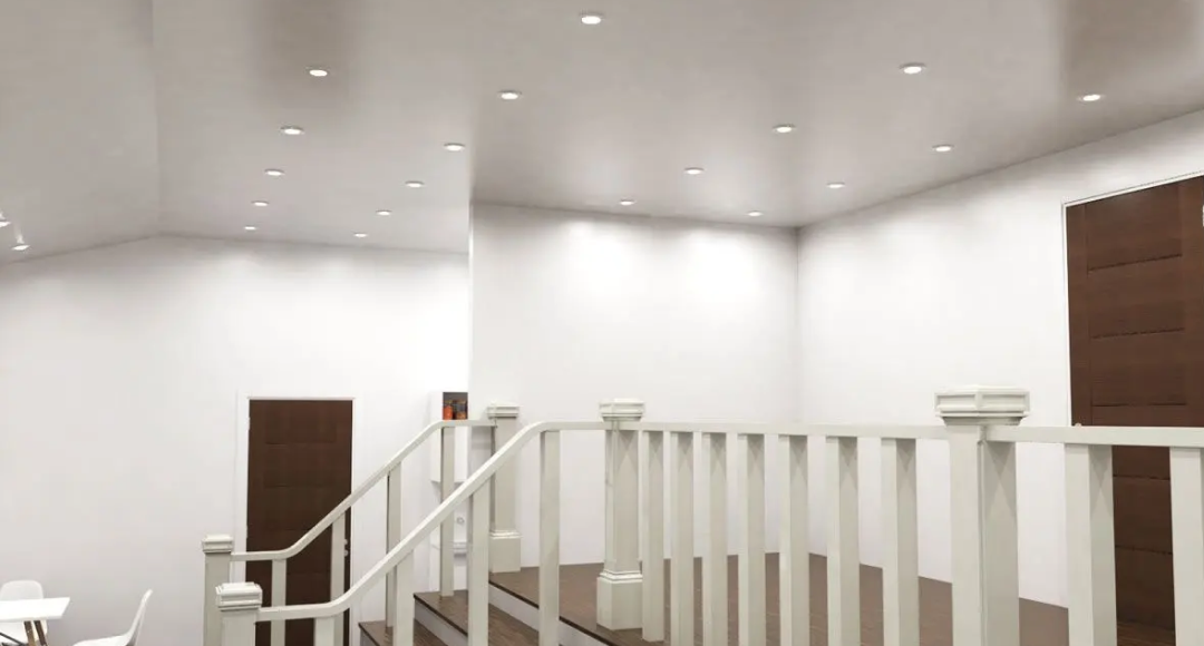 A staircase illuminated by LED downlights.