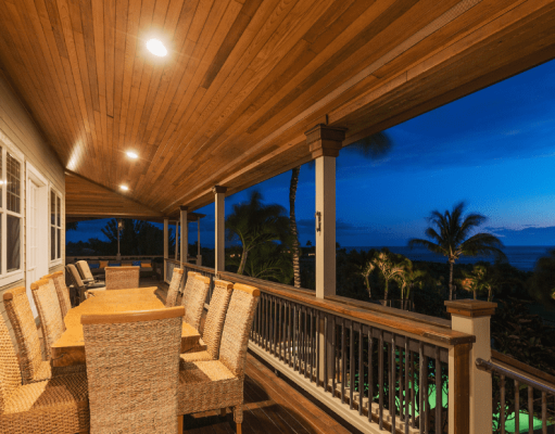 An elevated patio illuminated by LED downlights.