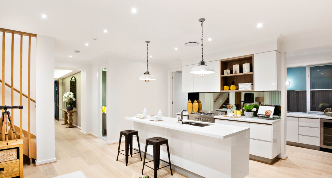 Kitchen illuminated by LED downlights.