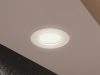 A close-up of the FRK-T-W downlight (installed in a bedroom).