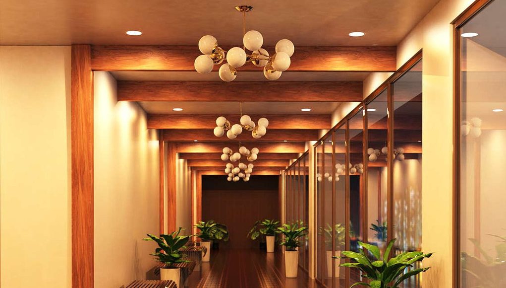 A hallway illuminated by LED downlights.